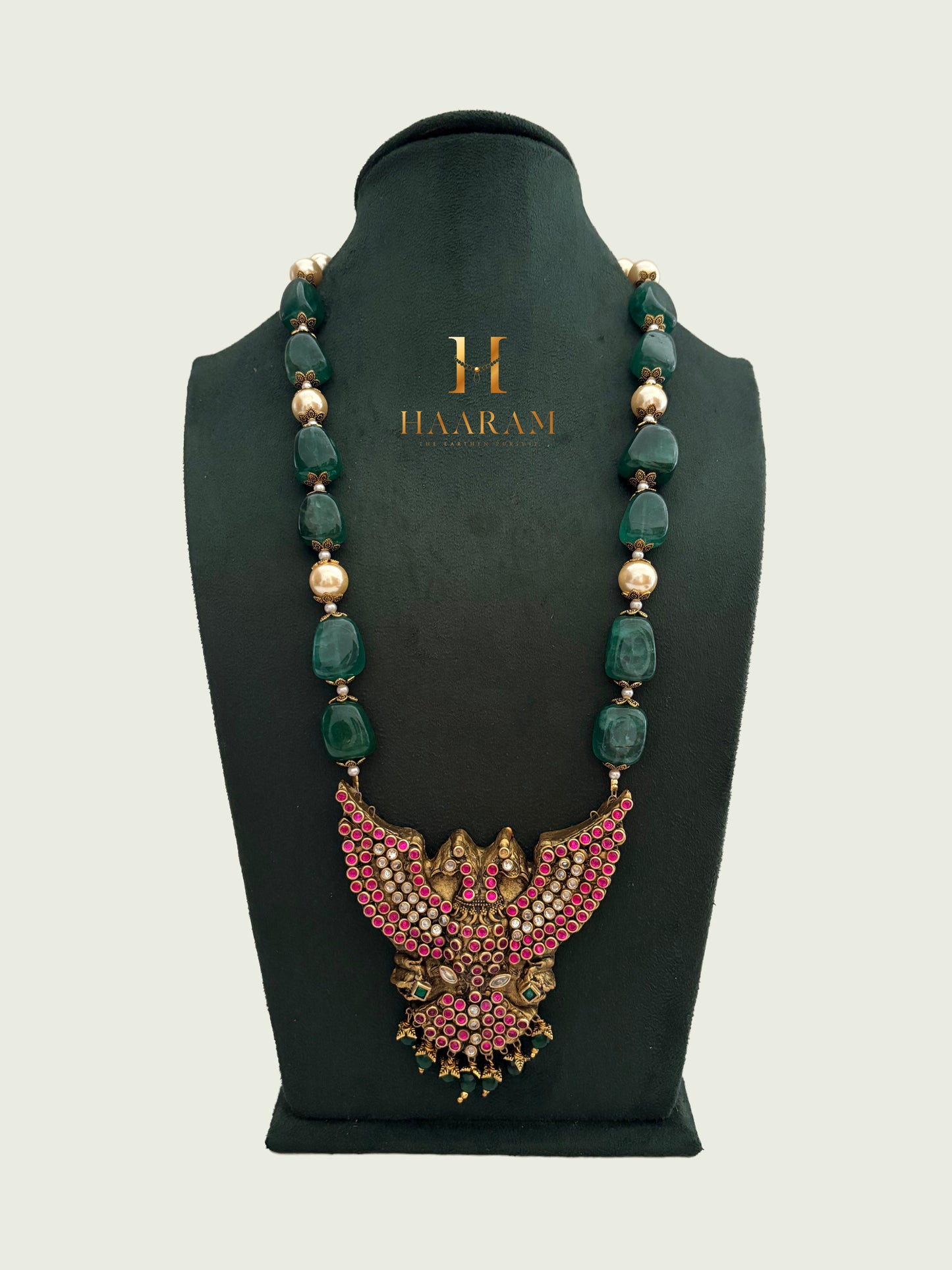 Terracotta necklace with green beads and peacock design pendant