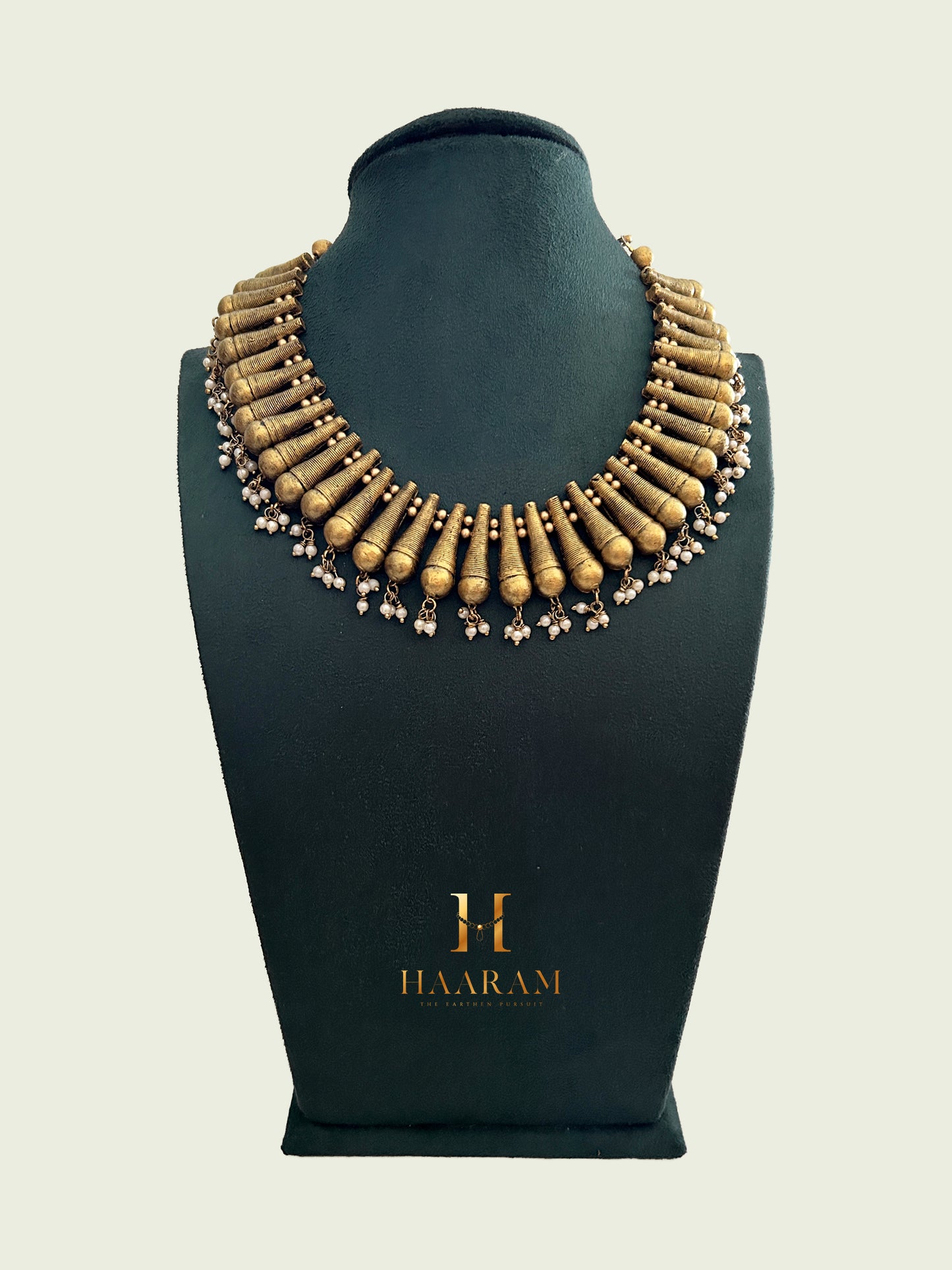 Handcrafted terracotta necklace with layered cylindrical and spherical gold with Pearl from Haarambyyashh