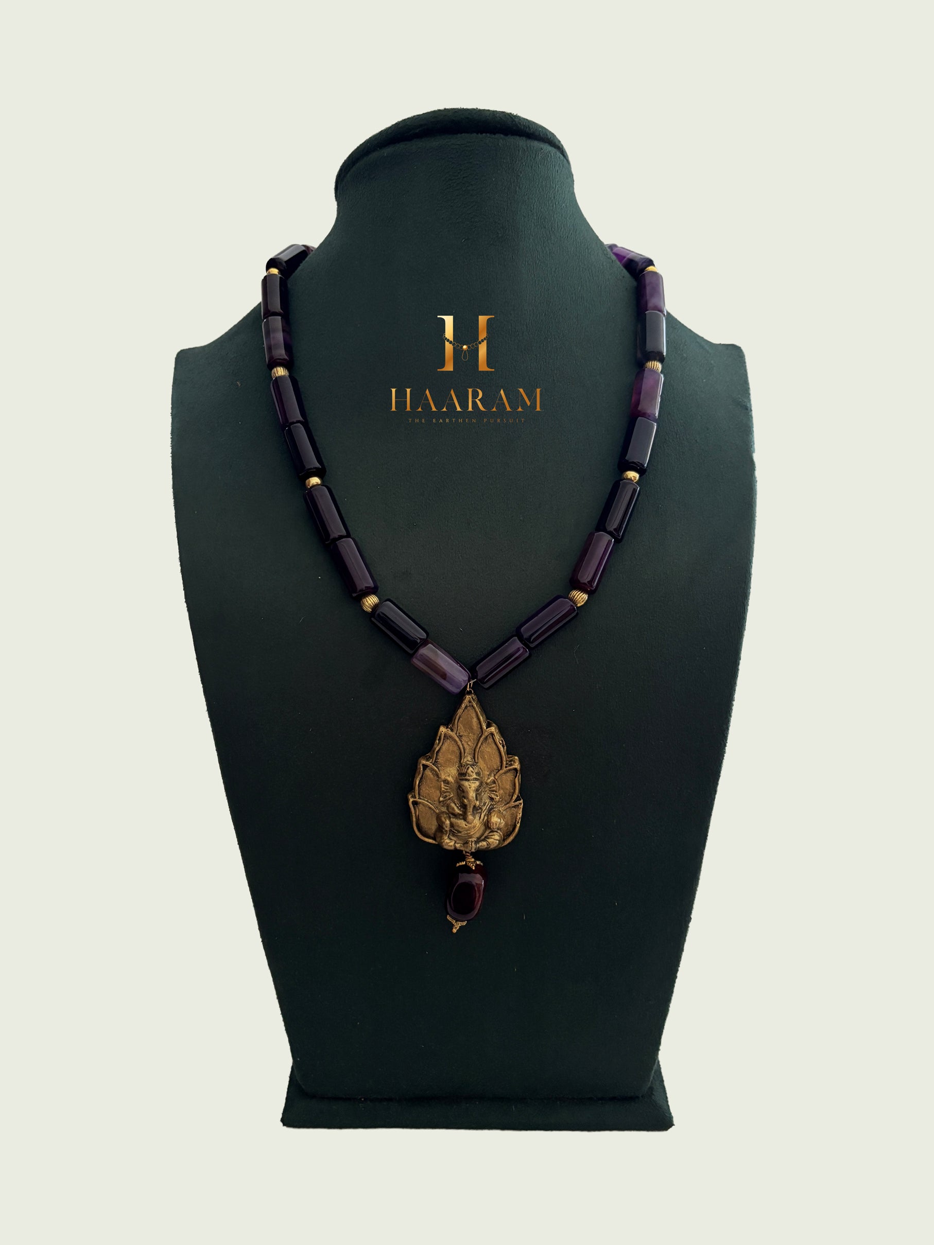 Necklace with Navy beads and a leaf terracotta pendant by haarambyyashh