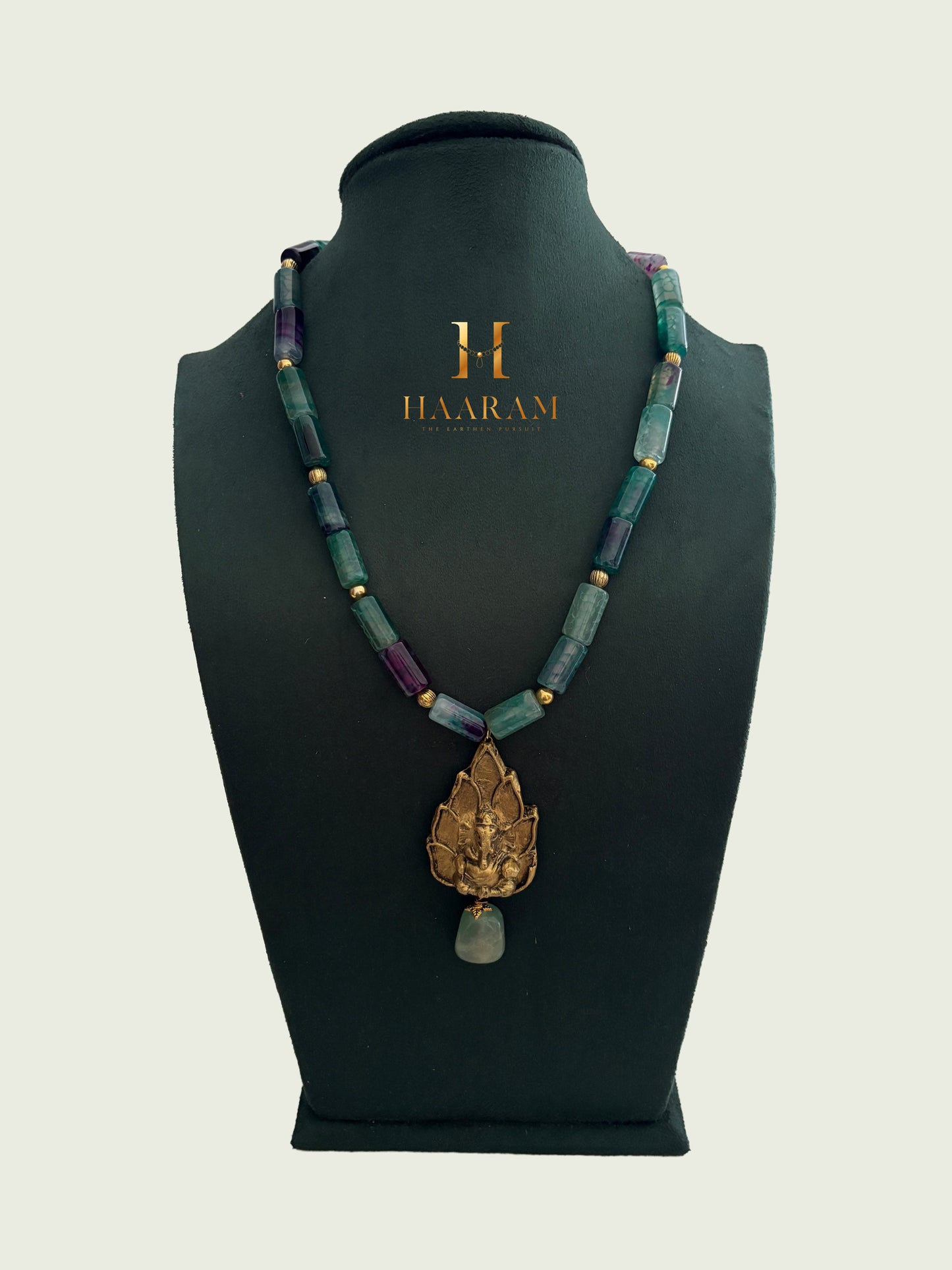Necklace with Sky beads and a leaf terracotta pendant by haarambyyashh