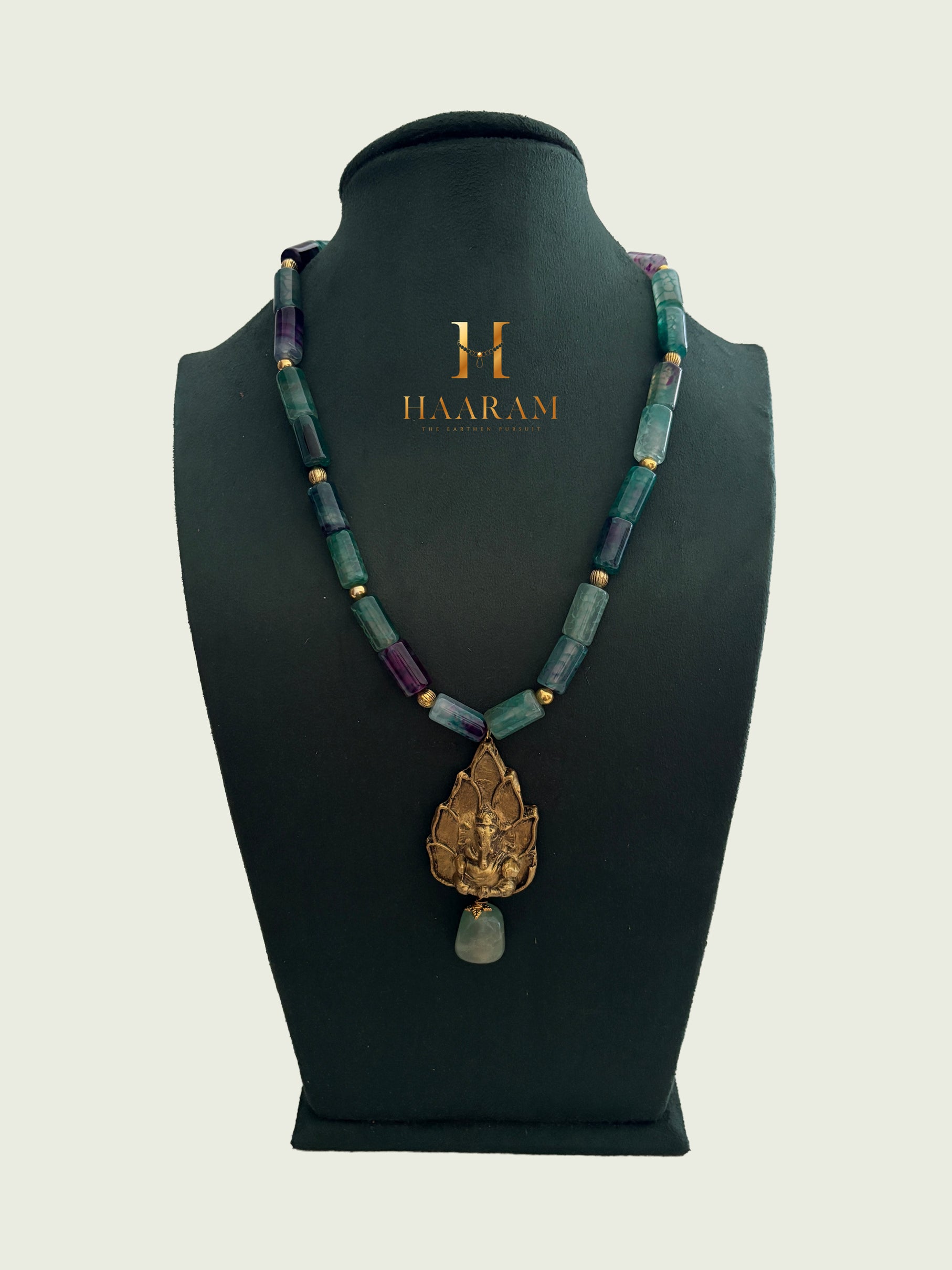 Necklace with Sky beads and a leaf terracotta pendant by haarambyyashh