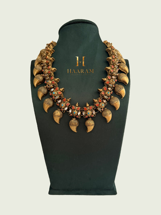 Handmade terracotta necklace with traditional mango motifs and antique finish