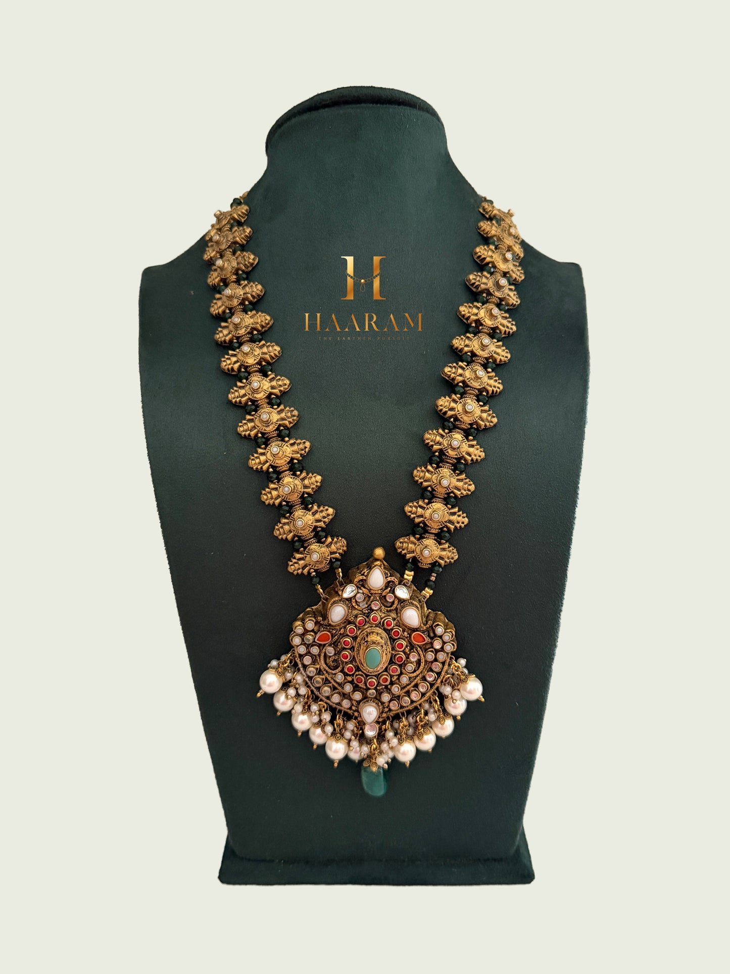 Royal terracotta necklace with antique statement pendant and pearl drop detailing