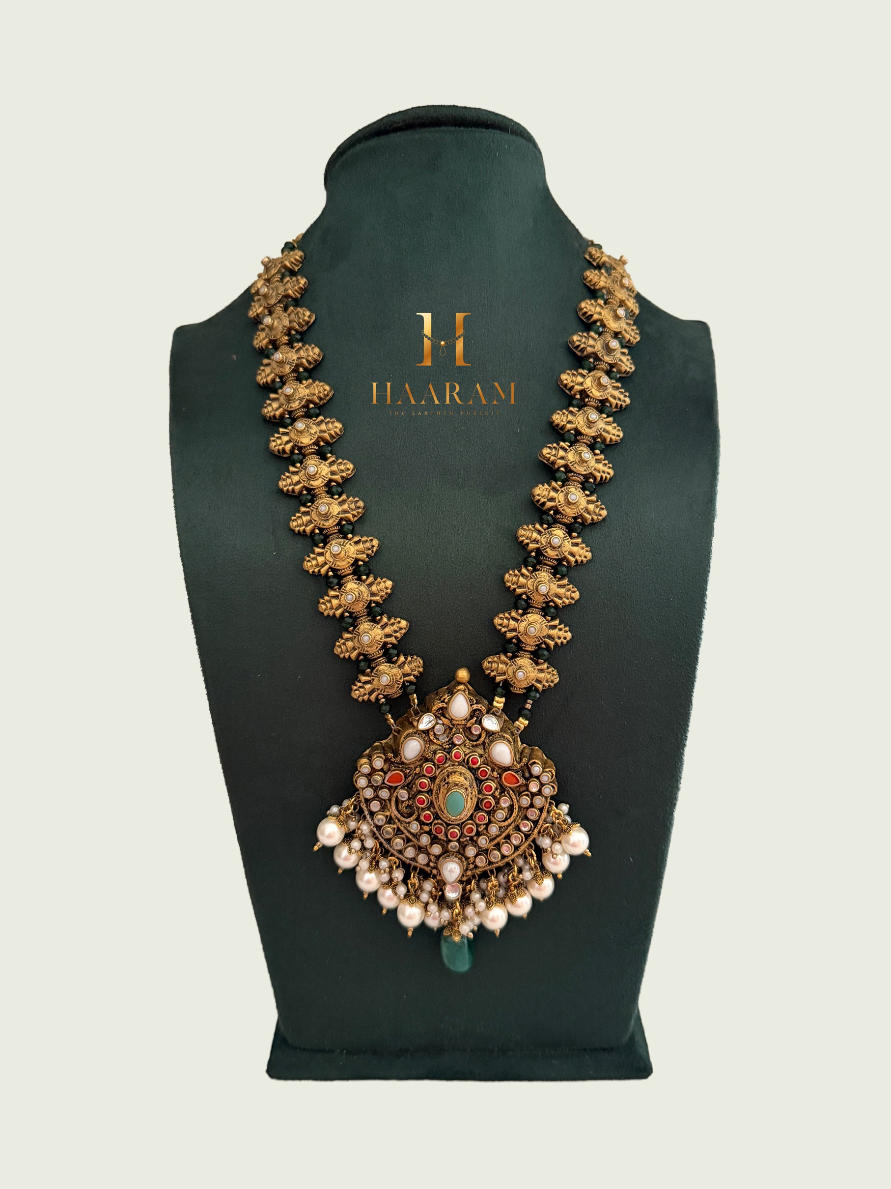 Royal terracotta necklace with antique statement pendant and pearl drop detailing