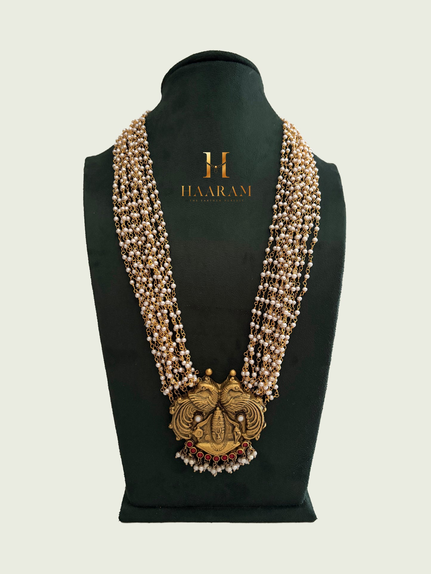 Heavy terracotta bridal necklace with multiple bead strands and goddess pendant by haarambyyashh